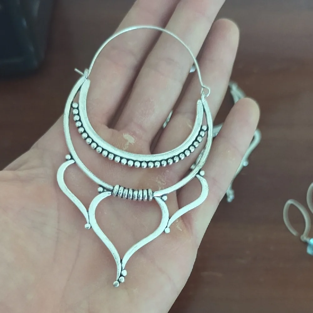 Elegant Silver Hoop Earrings - Picture 2 of 4